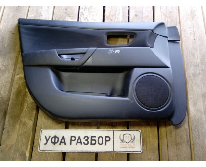 Обшивка двери передняя левая Mazda 3 (BL) 2009-2013